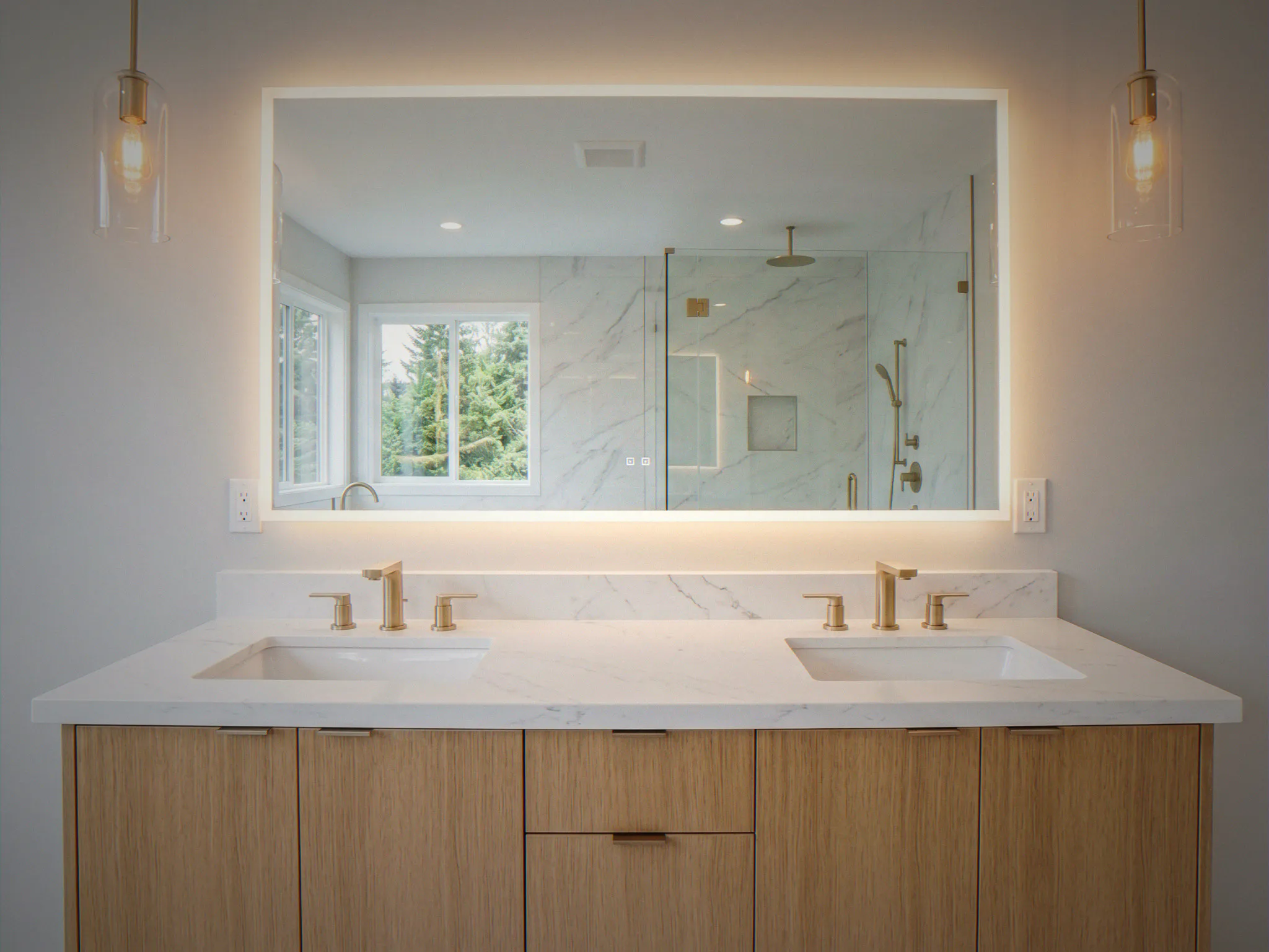 Double vanity with backlit mirror and brushed gold fixtures — Lake Tapps, WA